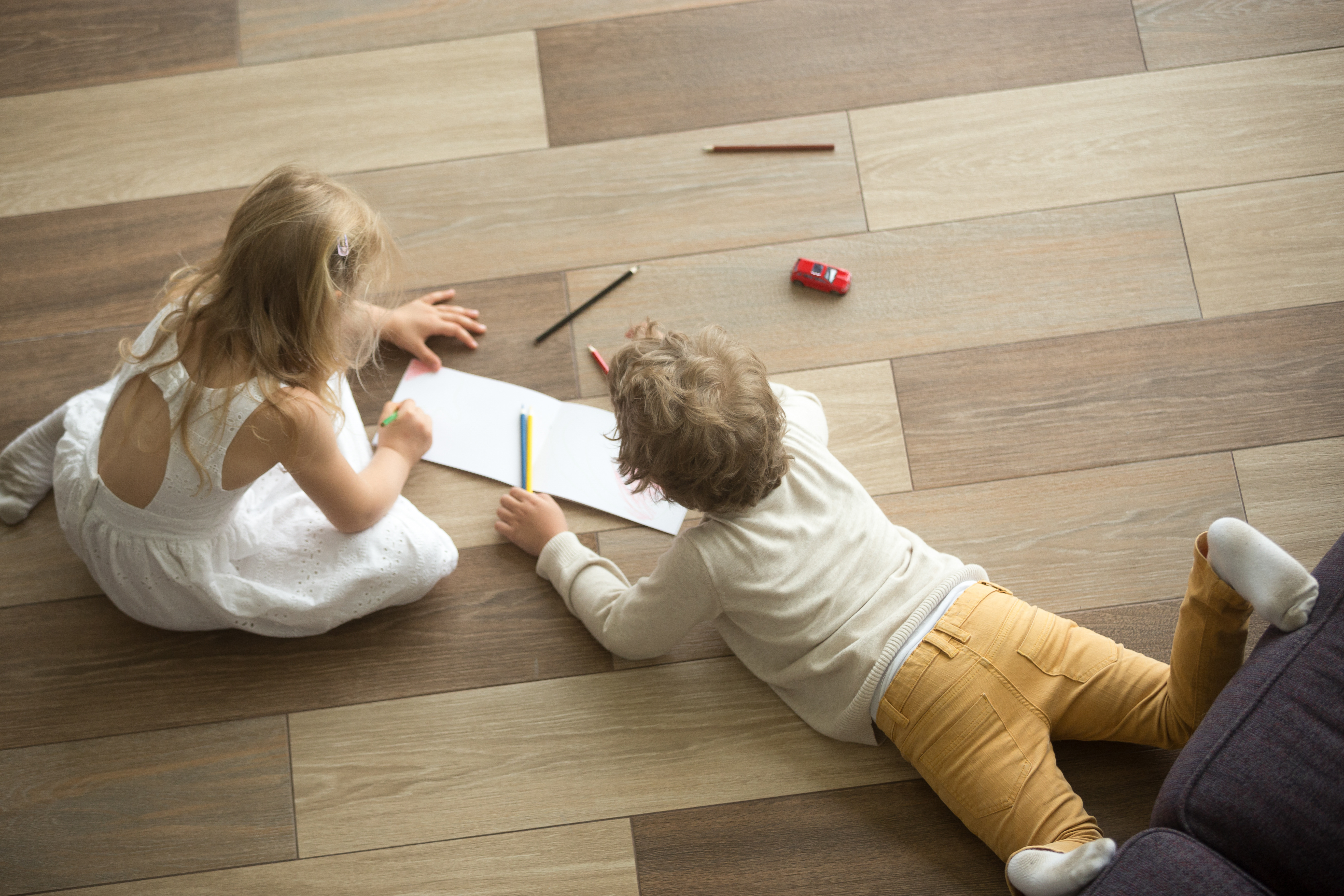 Kids playing on underfloor heating floor