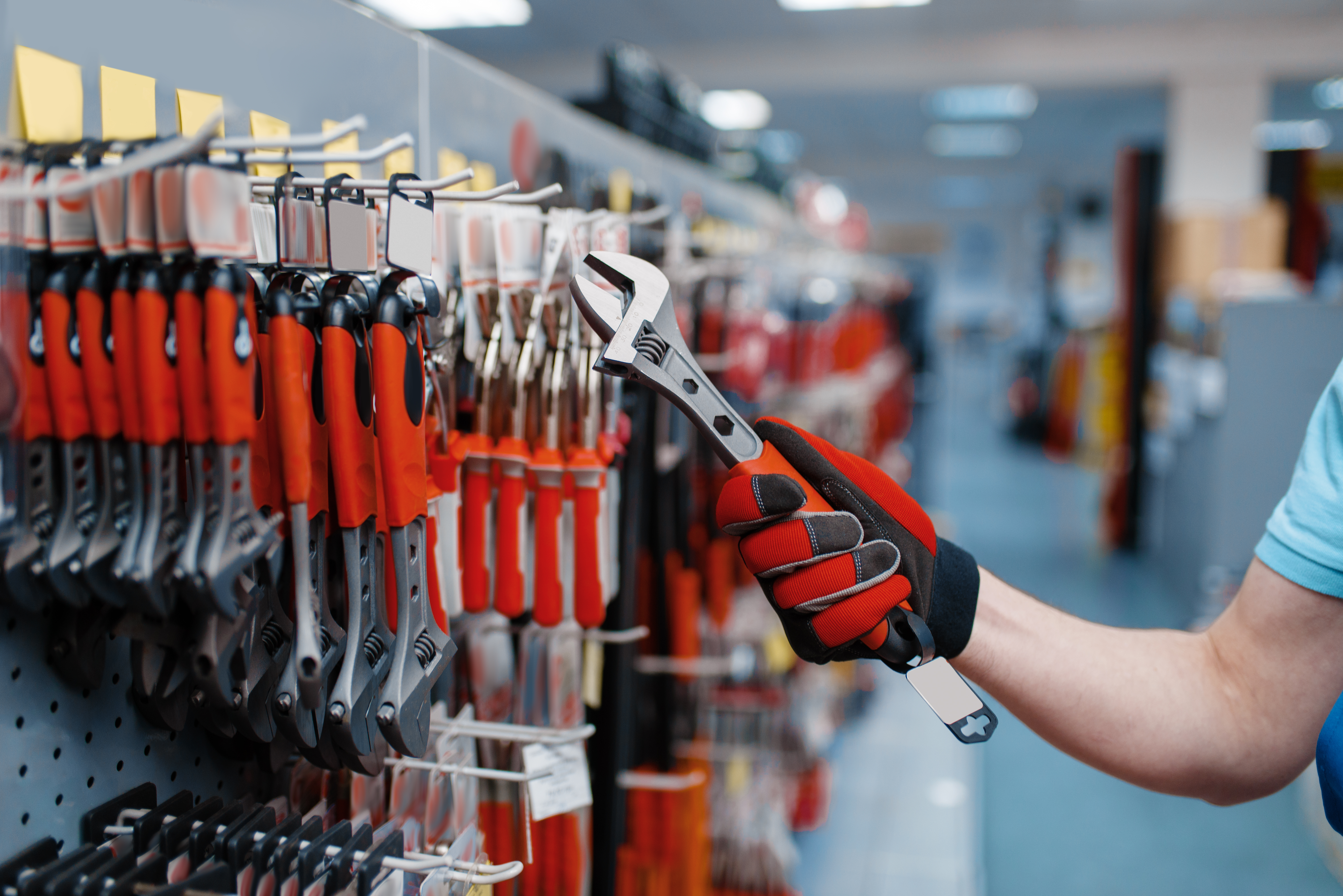 Builder using a Adjustable Wrench